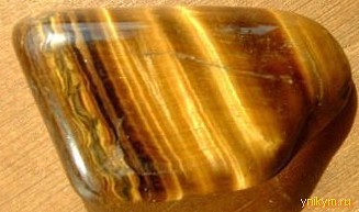 Внутренний рисунок тигрового глаза Волнообразный рисунок тигрового глаза